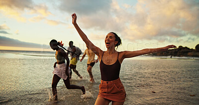 Buy stock photo Holiday, running and friends in ocean water for freedom, vacation or summer celebration on island. Group, sea and people race at beach for energy to travel, splash or excited on adventure at sunset