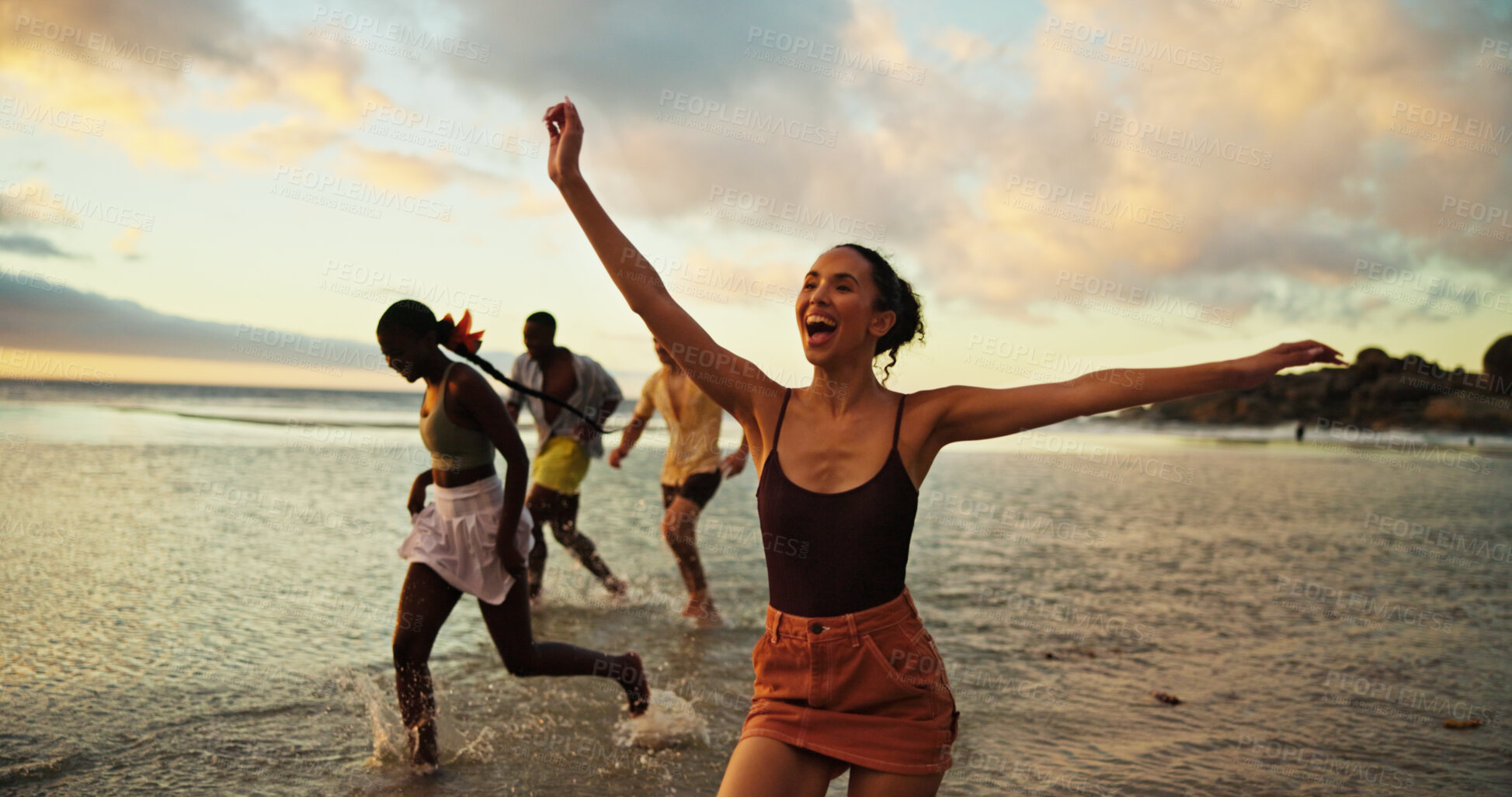 Buy stock photo Holiday, running and friends in ocean water for freedom, vacation or summer celebration on island. Group, sea and people race at beach for energy to travel, splash or excited on adventure at sunset
