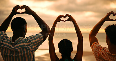 Buy stock photo Group, heart hands and friends by sunset, ocean and back with connection for love with care by sea. People, together and community for symbol, sign or support with kindness on vacation at beach