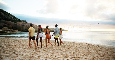 Buy stock photo Travel, holiday and friends walking on beach for vacation or summer trip on tropical island together at sunset. Group, tourism and people at ocean for relax, bonding and back view on adventure at sea