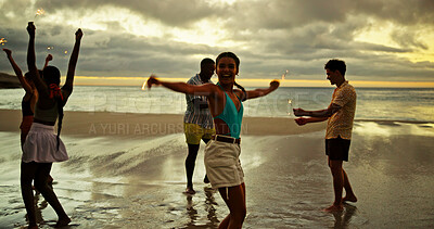 Buy stock photo Happy, friends and dance with sparkler on beach for travel celebration, freedom and summer holiday. Excited, people and fireworks for vacation achievement, tropical gathering an getaway for New Years