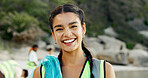 Charity, portrait and recycling with woman on beach for community service or conservation. Cleaning, earth day and smile of volunteer outdoor on coast for activism, responsibility or sustainability