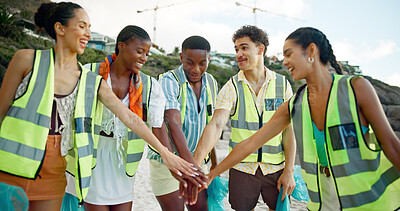 Buy stock photo People, volunteer and beach with hands together for community service, recycling or mission in nature. NGO group, responsibility or team piling with stack for duty, global warming or climate change