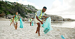Cleaning, plastic bag and recycling with people on beach for conservation or environmentalism. Community, earth day and teamwork with volunteer friends outdoor for responsibility or sustainability