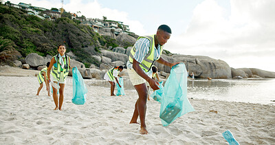 Buy stock photo Volunteer, plastic bag and recycling with people on beach for conservation or environmentalism. Community, earth day and teamwork with friends cleaning outdoor for responsibility or sustainability