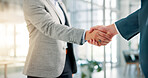 Handshake, hands and agreement for deal, meeting and closeup of partnership in office or negotiation. Team, thank you and people with gesture for collaboration, corporate and opportunity for business