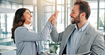 Man, woman and high five with smile at office, celebration or goals with target, profit or revenue. Business people, cheers and happy for success, excited or growth for investment portfolio at agency