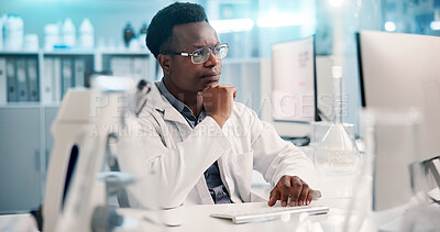 Buy stock photo Computer, thinking and black man in laboratory for research, development or science ideas. Online results, vaccine and scientist on website review for medical study, innovation or biotech engineering