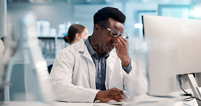 Buy stock photo Laboratory, man and computer with headache for doctor, medical compliance and burnout for deadline. Stress, male person and scientist with migraine for research results, eye strain and pain in clinic