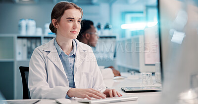 Buy stock photo Computer, woman and scientist typing in laboratory for medical research, discovery or innovation, Tech, internship and female biologist with pharmaceutical report for futuristic genetic development.