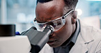 Microscope, black man and scientist in laboratory for project, discovery or research on medical organisms. Biotechnology, goggles and African biologist with equipment for DNA review for innovation.
