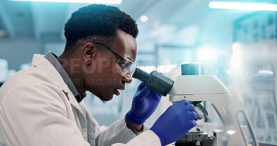 Buy stock photo Microscope, black man and scientist in lab for research, discovery or project on medical organisms. Biotechnology, goggles and African biologist with equipment for DNA review for innovation.