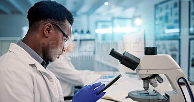 Buy stock photo Reading, man or scientist on tablet to study in lab for medical research, discovery or genes innovation, Microscope, science or biologist with pharmaceutical report or futuristic genetic development