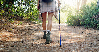 Buy stock photo Hiking, back and legs of woman in nature for adventure, trekking and travel outdoors. Forest, fitness and person with stick for wellness, walking and exercise to explore on holiday and vacation