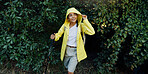 Trekking pole, woman and walking in forest for travel adventure, expedition and exploring nature. Happy, person and hiking with backpack in woods for sightseeing, balance and journey with scenery