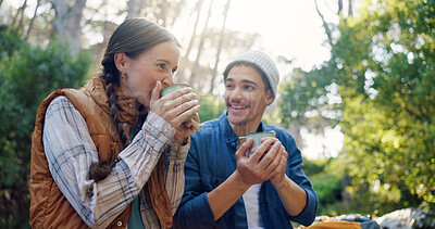 Buy stock photo Outdoor, camping and couple with coffee, drinking and bonding with warm beverage in nature and adventure. Hiking, travel and people with hot tea for cold weather, traveller and tourists on vacation