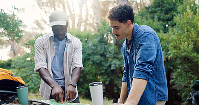 Buy stock photo Men, friends and forest with map for hiking, trekking plan and location with travel in the woods. Navigation, direction and male people with pointing for trail strategy, vacation or exploring nature