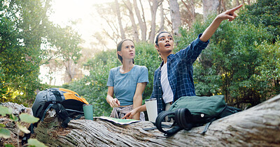 Buy stock photo Hiking, map and women on mountain pointing for navigation, direction and location. Fitness, friends and people in conversation with paper guide on adventure, journey and travel outdoors for trekking