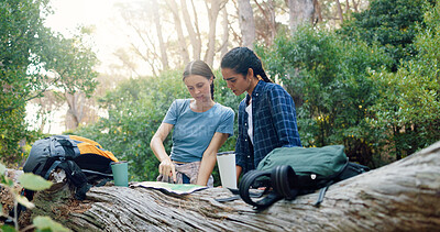 Buy stock photo Hiking, map and women on mountain with paper for navigation, direction and location. Fitness, friends and people in conversation with guide on adventure, journey and travel outdoors for trekking
