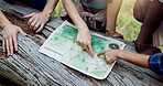 Map, nature and hands of people hiking in forest with route plan for adventure together. Travel, outdoor and friends with paper guide for trekking in woods on weekend trip for discovery or journey.