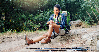 Buy stock photo Woman, hiker and knee injury with pain for accident, fall or emergency on trekking trail or path in nature. Female person, ache or joint inflammation with backpack for sprain, sore leg or strain