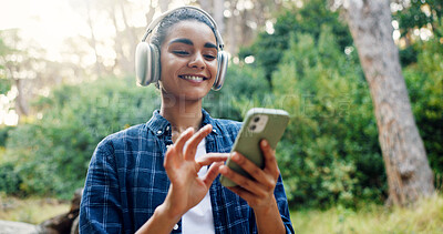 Buy stock photo Woman, music and headphones with phone in forest for hiking podcast, audio playlist and track for cardio. Happy, person and sound subscription on smartphone for album song and wellness in environment