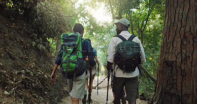 Buy stock photo Hiking, back and friends in nature walking for adventure, trekking and travel on holiday. Mountain, hobby and men and women outdoors in conversation for wellness, fresh air and exercise to explore