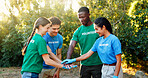 Stack of hands, nature and group of volunteers in park cleaning for earth day responsibility. Motivation, teamwork and NGO workers outdoor in field for environmental maintenance with charity.
