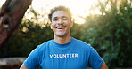 Volunteer, man and happy with portrait in nature for green project, community service and environmental outreach. Sustainable NGO, person and confidence at park for social responsibility or earth day