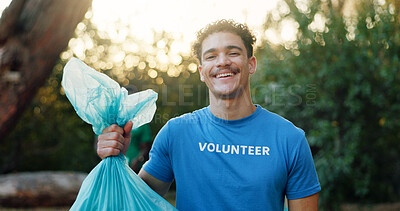 Buy stock photo Volunteer, man and portrait with plastic bag at park for environment cleanup, community service and recycling. Sustainable NGO, person and happy in nature for social responsibility and green project