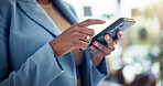 Business, woman and hands with phone in office for social media scroll, reading email and internet browsing. Professional, employee and smartphone for text message, mobile chat response or work break