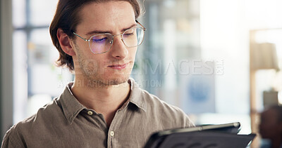 Buy stock photo Business, reading and tablet with editor man in office for online magazine publication. App, creative and editing with confident employee in workplace for article approval or publishing schedule