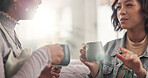 Coffee, conversation and woman friends on sofa in living room of home together for reunion or visit. Break, drink and relax with people in apartment for gossip, relationship or social on weekend
