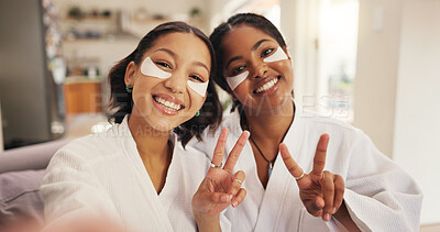 Buy stock photo Beauty, eye mask and selfie with friends in home together for pampering or skincare routine. Aesthetic, peace sign and profile picture with women in apartment for dermatology or social media post