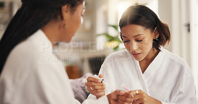 Buy stock photo Beauty, nail polish and self care with friends in home living room together for me time or spa day. Manicure, relax and wellness with women in apartment for cosmetics, dermatology or transformation