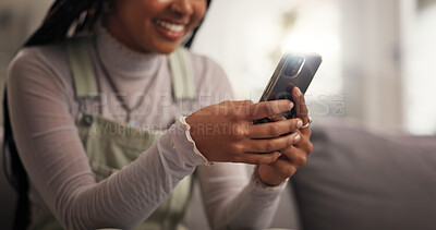 Buy stock photo Happy woman, hands and texting with phone on sofa for communication or social media at home. Closeup, female person or user typing with smile on mobile smartphone for network app or online chatting
