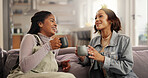 Bonding, drinking coffee and woman friends on sofa in living room of home together for reunion or visit. Break, cup and drinking with happy people talking in apartment for gossip or social on weekend