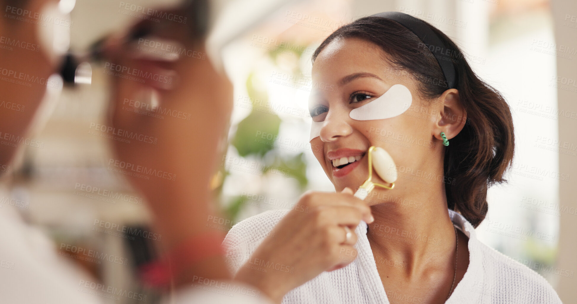 Buy stock photo Eye mask, facial massage and skincare with friends in home together for beauty or pampering. Aesthetic, smile and transformation with happy women in bathroom of apartment for dermatology routine