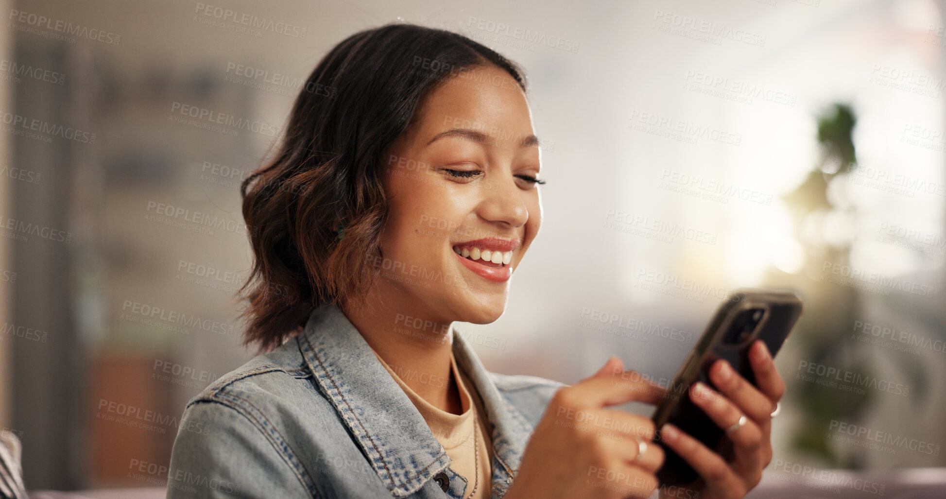 Buy stock photo Home, relax or teenager with smile, smartphone or funny meme with internet, social media or text. Apartment, mobile user or happy girl with cellphone, connection or digital app for message to contact