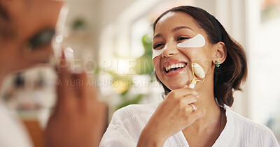 Buy stock photo Eye mask, facial massage and laughing with friends in home together for pampering or skincare. Cosmetic, beauty and transformation with funny women in bathroom of apartment for dermatology routine