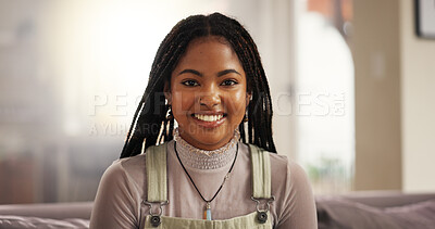 Buy stock photo Happy, relax and portrait of black woman on sofa in home with calm, weekend or break for peace. Smile, confident and face of African female person on couch in living room at apartment with pride.