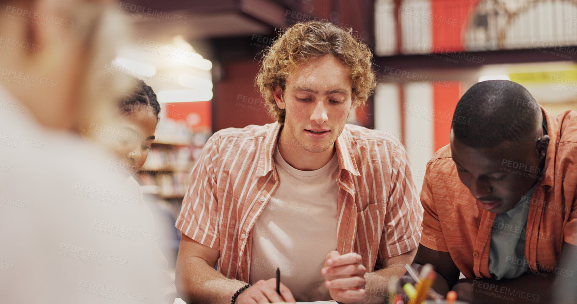 Buy stock photo University, reading and study with man and friends in library for research project, education and learning. Future, knowledge and college assignment with people and discussion for students and team