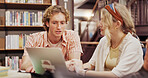 Students, man and girl with laptop at library for group project, research and education at university. People, computer and together with books, assessment and learning for scholarship at college