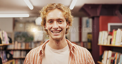 Buy stock photo Man, student and portrait with smile at library, excited or education for development with research at college. Person, happy and pride for learning, confident or scholarship at university in Germany
