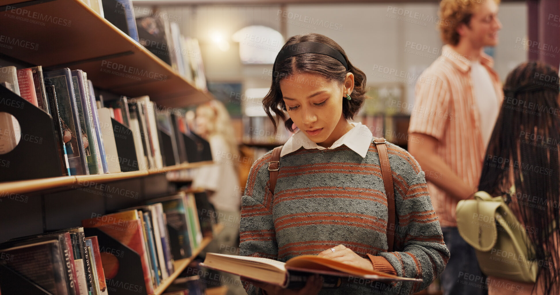 Buy stock photo Woman, reading and book as student in library for research, studying and exam preparation. Female person, textbook and learning with information, university knowledge and education thesis at college