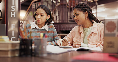 Buy stock photo Students, women and together with laptop at library for group project, research or education at university. People, girl and review with problem solving, notes or learning for scholarship at college