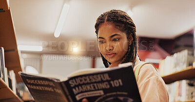Buy stock photo Woman, reading and book as student in library for research, study marketing and career preparation. African person, textbook or information on business knowledge, education exam and university thesis