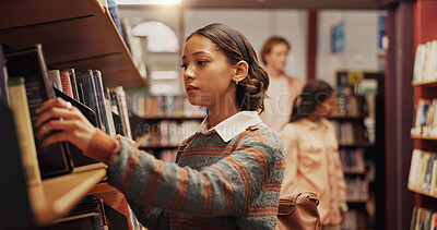 Buy stock photo Woman, student and shelf with books in library for choice, textbook search and studying for exam. Female person, decision or literature information for knowledge, education and assessment at college