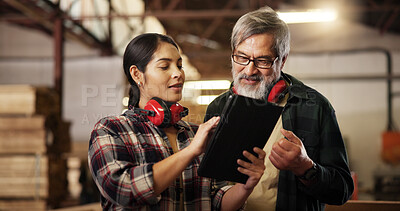Buy stock photo Workshop, team and people with tablet, carpenter and intern with research for woodworking technique. Online, mature mentor and review of info on tech, woman and collaboration for furniture business