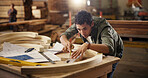Planning, measure and carpenter with man for woodworking production, furniture and manufacturing. Contractor, handyman and framework with person for building project, timber and construction